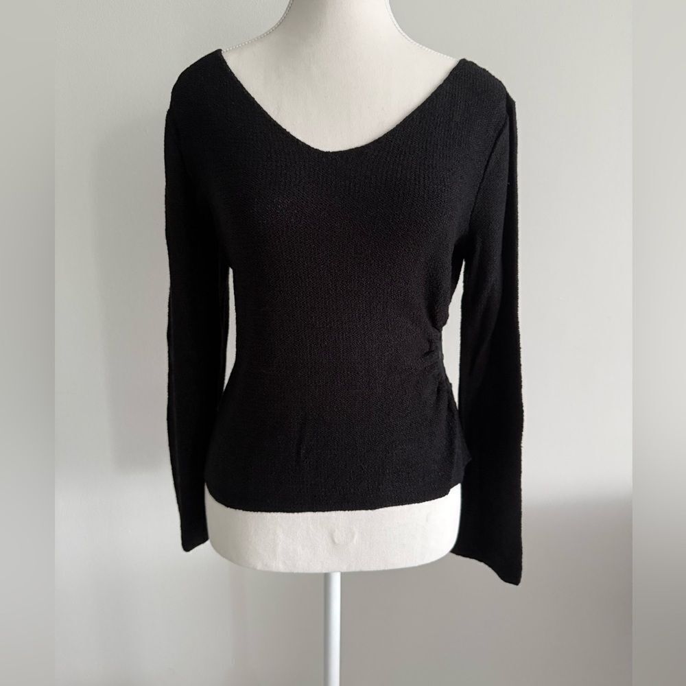 Brenda Serper black knit sweater in size S with peekaboo side preowned
